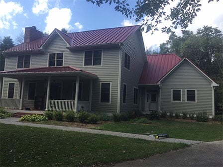 House with Beautiful Red Roof - Roofing in Frankfort, IN