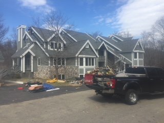 Commercial Roofing— House With Black Pickup Car in Front in Frankfort, IN