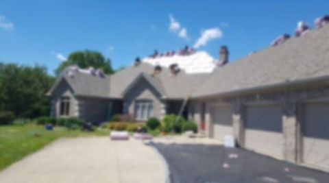 House with three garage — Roofing Contractor in Frankfort, INd